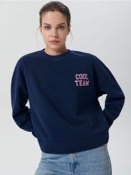 Bluza z nadrukiem - granatowy. Niebieskie bluzy damskie Sinsay, l, bez wzorów, z bawełny, bez ramiączek, bez kaptura. W wyprzedaży za 29.99 zł.