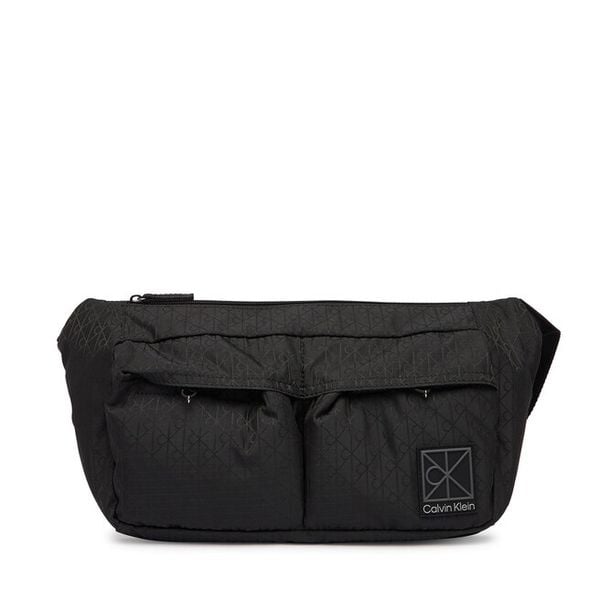 Nerka Calvin Klein. Czarne saszetki i nerki męskie Calvin Klein, bez wzorów. Za 409.99 zł.