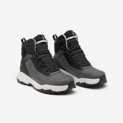 Buty turystyczne męskie Quechua MH900 wodoodporne. Czarne buty sportowe męskie QUECHUA, na zimę, bez wzorów, przed kolano, bez zapięcia, trekkingowe. Za 399.99 zł.