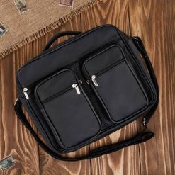 Skórzana torba męska na ramię czarna listonoszka A4 do pracy Abruzzo ABR-20. Czarne torby na ramię męskie z materiału, do ręki. Za 199.99 zł.