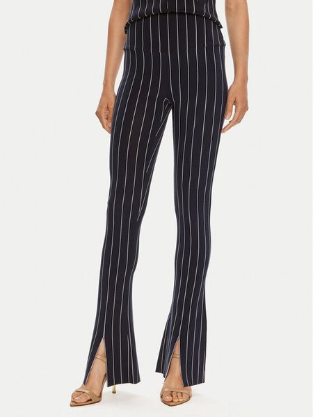 NORMA KAMALI Spodnie materiałowe KK1247PL016642 Granatowy Slim Fit. Niebieskie spodnie materiałowe damskie Norma Kamali, bez wzorów, z materiału. Za 559.99 zł.