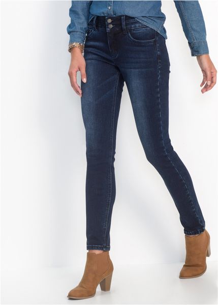 Modelujące dżinsy ze stretchem o kroju slim fit. Niebieskie jeansy damskie bonprix, bez wzorów, z jeansu, biznesowe. Za 169.99 zł.