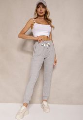 Szare Spodnie Dresowe z Bawełny o Kroju Jogger High Waist Cherisa. Szare spodnie dresowe damskie Renee, bez wzorów, z bawełny, eleganckie, z podwyższonym stanem. Za 49.99 zł.