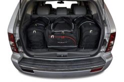 Torby Do Bagażnika Jeep Grand Cherokee 2004-2010 4Szt Kjust. Czarne torby podróżne damskie KJUST, bez wzorów, z kauczuku. Za 1,345.00 zł.