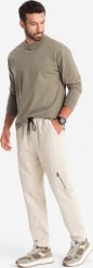 Ombre Dzianinowe męskie joggery z kieszeniami cargo kremowe V1 OM-PAJO-0199 L. Białe spodnie sportowe męskie Ombre, l, bez wzorów, z dzianiny. Za 239.99 zł.
