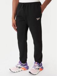 Reebok Spodnie dresowe Winchester Pant RK25146CCM Czarny Regular Fit. Czarne spodnie sportowe męskie Reebok, m, bez wzorów, z dresówki. Za 199.99 zł.