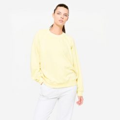 Bluza damska Domyos Gym & Pilates. Żółte bluzy damskie DOMYOS, xl, bez wzorów, z materiału, sportowe, bez ramiączek, bez kaptura. W wyprzedaży za 49.99 zł.
