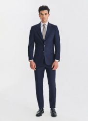 PAKO LORENTE - Wełniany granatowy garnitur męski. Niebieskie garnitury męskie Pako Lorente, m, bez wzorów, z wełny, biznesowe. Za 2,499.98 zł.