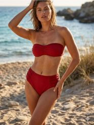 Dół od bikini z marszczeniami i wysokim stanem - czerwony. Czerwone stroje kąpielowe damskie Sinsay, l, bez wzorów. W wyprzedaży za 19.99 zł.