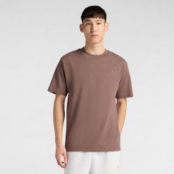 Koszulka męska New Balance MT41533ABP – brązowa. Brązowe koszulki sportowe męskie New Balance, l, bez wzorów, z dresówki, bez ramiączek. Za 169.99 zł.