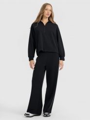 4F Spodnie dresowe z szerokimi nogawkami z modalem damskie - czarne XL. Czarne spodnie dresowe damskie 4F, bez wzorów, z dresówki, z podwyższonym stanem. Za 189.99 zł.