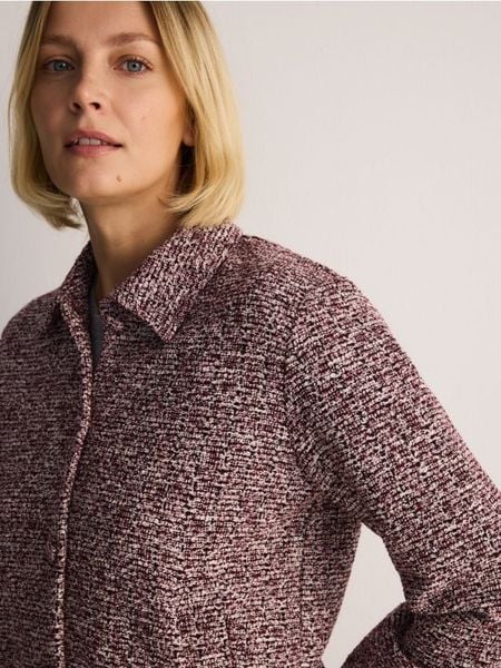 Tweedowa marynarka z kieszeniami - mahoniowy. Brązowe marynarki i żakiety damskie Reserved, bez wzorów, z dzianiny, bez kołnierzyka, bez ramiączek. W wyprzedaży za 159.99 zł.