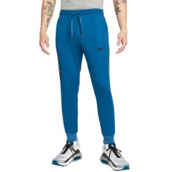 Męskie Spodnie Do Biegania Libero DriFIT. Niebieskie spodnie sportowe męskie Nike, m, bez wzorów, do biegania. Za 267.99 zł.