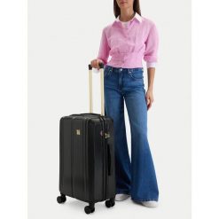 Walizka średnia Nine West. Czarne walizki damskie Nine West, bez wzorów, średnie. Za 359.99 zł.