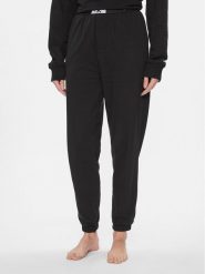 Calvin Klein Underwear Spodnie piżamowe 000QS7085E Czarny Relaxed Fit. Czarne piżamy damskie Calvin Klein Underwear, bez wzorów, z bawełny, bez ramiączek. Za 259.99 zł.