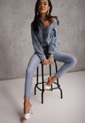 Niebieskie Jeansy Typu Skinny z Bawełny Nevitaes. Niebieskie jeansy damskie Renee, bez wzorów, z bawełny, z podwyższonym stanem, krótkie. Za 99.99 zł.