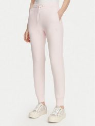 Guess Spodnie dresowe V2YB18 K7UW2 Różowy jasny Regular Fit. Czerwone spodnie dresowe damskie Guess, z aplikacjami, z dresówki. Za 364.99 zł.