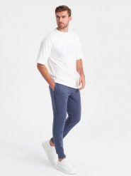 Spodnie dresowe męskie z tkaniny ottoman - ciemnoniebieskie V2. Niebieskie spodnie sportowe męskie Ombre Clothing, m, bez wzorów, z bawełny. W wyprzedaży za 39.99 zł.