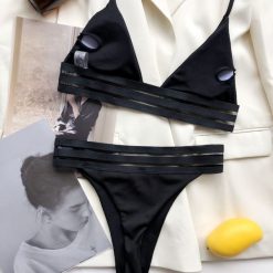 Strój kąpielowy damski w paski na plażę Phelia. Czarne stroje kąpielowe damskie Intica, l, bez wzorów, z materiału. Za 139.00 zł.