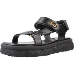 Sandały GUESS FLJLAN ELE03 Czarny. Czarne sandały damskie Guess, z aplikacjami, z syntetyku, bez obcasa, bez zapięcia. Za 541.99 zł.