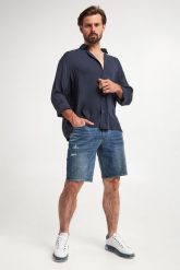 Spodenki jeansowe męskie ARMANI EXCHANGE. Szorty męskie Armani Exchange, bez wzorów, z jeansu. W wyprzedaży za 404.25 zł.