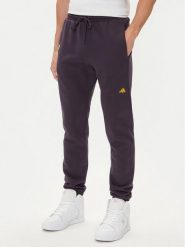 Adidas Spodnie dresowe Fortnite JV8015 Fioletowy Regular Fit. Fioletowe spodnie sportowe męskie Adidas, m, bez wzorów, z bawełny. Za 309.99 zł.