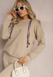 Beżowa Bawełniana Bluza z Sznurkami i Kapturem Tyche. Brązowe bluzy damskie Renee, bez wzorów, z bawełny, casualowe, bez ramiączek, z kapturem. Za 89.99 zł.