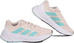 Adidas Buty damskie do biegania adidas Questar różowo-błękitne IF2243 40. Czerwone obuwie sportowe damskie Adidas, bez wzorów, bez zapięcia, do biegania. Za 337.64 zł.