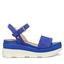 Sandały Geox. Niebieskie sandały damskie Geox, bez wzorów, bez obcasa, na koturnie, bez zapięcia. Za 359.99 zł.