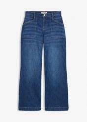 Dżinsy z szerokimi nogawkami, mid waist, i naszywanymi kieszeniami. Niebieskie jeansy damskie bonprix, bez wzorów, z jeansu. Za 149.99 zł.