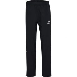 Damskie spodnie dresowe Hummel Core 2.0 Woven. Białe spodnie dresowe damskie Hummel, bez wzorów, z dresówki, eleganckie, na fitness i siłownię. Za 230.00 zł.