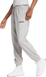 Adidas Spodnie damskie adidas Essentials Linear French Terry Cuffed jasnoszare JC5953 XL. Szare spodnie dresowe damskie Adidas, bez wzorów, sportowe. Za 214.91 zł.