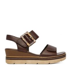 Sandały Remonte. Brązowe sandały damskie Remonte, bez wzorów, bez obcasa, na koturnie, bez zapięcia. Za 379.99 zł.