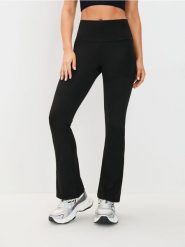 Legginsy flare GYM HARD - czarny. Czarne legginsy damskie Sinsay, bez wzorów. Za 49.99 zł.