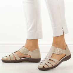 Beżowo-złote skórzane sandały damskie T.Sokolski 622. Brązowe sandały damskie Sokolski, bez wzorów, z materiału, bez obcasa, na obcasie, bez zapięcia. Za 199.00 zł.