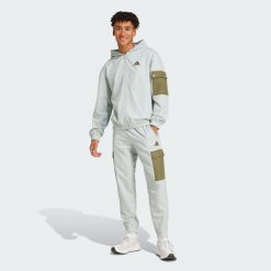 Dres Sportswear Woven Cargo. Czarne komplety dresowe męskie Adidas, s, bez wzorów, z dresówki. W wyprzedaży za 230.45 zł.