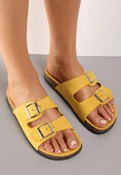 Żółte Klapki Kleogoria. Żółte klapki damskie Born2be, na lato, bez wzorów, eleganckie, bez obcasa, na płaskiej podeszwie, bez zapięcia. Za 59.99 zł.