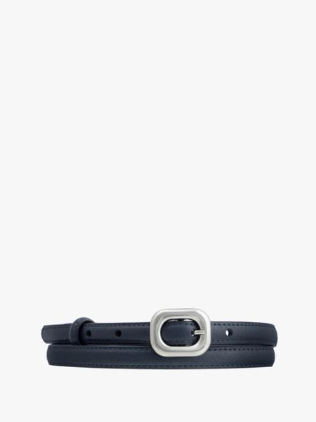 Granatowy pasek damski ze skóry licowej ze srebrną klamrą. Niebieskie paski damskie Ryłko, bez wzorów, ze skóry. Za 79.99 zł.