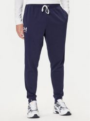 Under Armour Spodnie dresowe Ua Rival Terry Jogger 1380843-410 Granatowy Fitted Fit. Niebieskie spodnie sportowe męskie Under Armour, m, bez wzorów, z bawełny, na fitness i siłownię. Za 139.99 zł.
