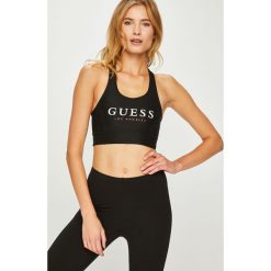 Guess Jeans - Biustonosz Active. Czarne bielizna sportowa damska Guess Jeans, m, z aplikacjami, z elastanu. W wyprzedaży za 89.90 zł.