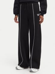 Reebok Spodnie dresowe Oliwia RK25683CCW Czarny Regular Fit. Czarne spodnie dresowe damskie Reebok, bez wzorów, z dresówki. Za 199.99 zł.
