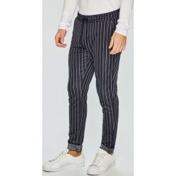 Only & Sons - Spodnie. Niebieskie spodnie materiałowe męskie Only & Sons, bez wzorów, z bawełny. W wyprzedaży za 99.90 zł.