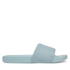 Klapki Calvin Klein Jeans. Niebieskie klapki damskie Calvin Klein Jeans, bez wzorów, z jeansu, bez obcasa, bez zapięcia. Za 99.99 zł.