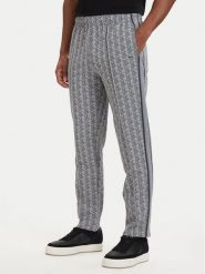 Lacoste Spodnie dresowe Paris Monogram XH1440 Szary Regular Fit. Szare spodnie sportowe męskie Lacoste, m, bez wzorów, z bawełny. Za 749.99 zł.