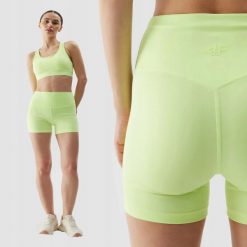 SPODENKI DAMSKIE 4F TRENINGOWE LEGGINSY KRÓTKIE KOLARKI KRÓTKIE KOLOR ZIELONY. Zielone legginsy damskie 4F, bez wzorów, z materiału. Za 99.99 zł.