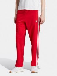 Adidas Spodnie dresowe adicolor Classics Firebird IJ7057 Czerwony Regular Fit. Czerwone spodnie sportowe męskie Adidas, m, bez wzorów, z dresówki. Za 179.99 zł.