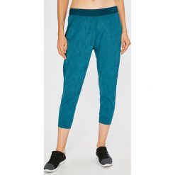 Under Armour - Spodnie Balance. Zielone legginsy damskie Under Armour, bez wzorów, z dzianiny. W wyprzedaży za 159.90 zł.