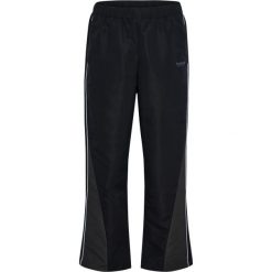 Spodnie dresowe Hummel. Czarne spodnie dresowe damskie Hummel, bez wzorów, z dresówki, sportowe, na fitness i siłownię. Za 278.50 zł.
