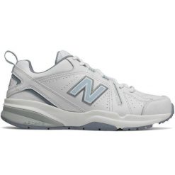 Skórzane Buty Sportowe Dla Kobiet. Białe obuwie sportowe damskie New Balance, na zimę, bez wzorów, bez zapięcia. Za 655.99 zł.