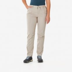 Spodnie turystyczne damskie Quechua NH500 Regular. Brązowe spodnie sportowe damskie QUECHUA, na lato, bez wzorów, z elastanu, sportowe, trekkingowe. Za 119.98 zł.